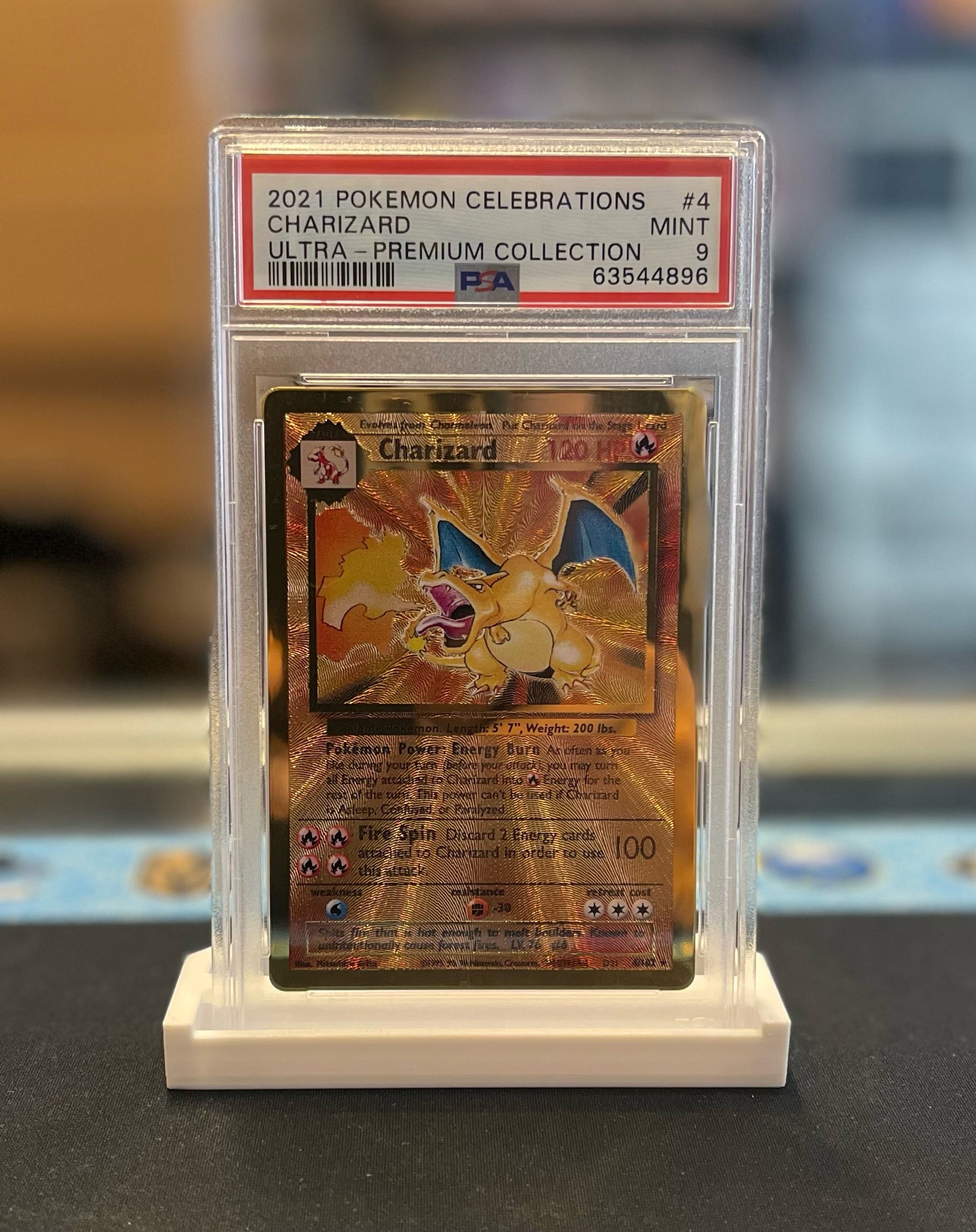 PSA 9 - Pokemon Celebrations Ultra Premium Collection Charizard (metal)
